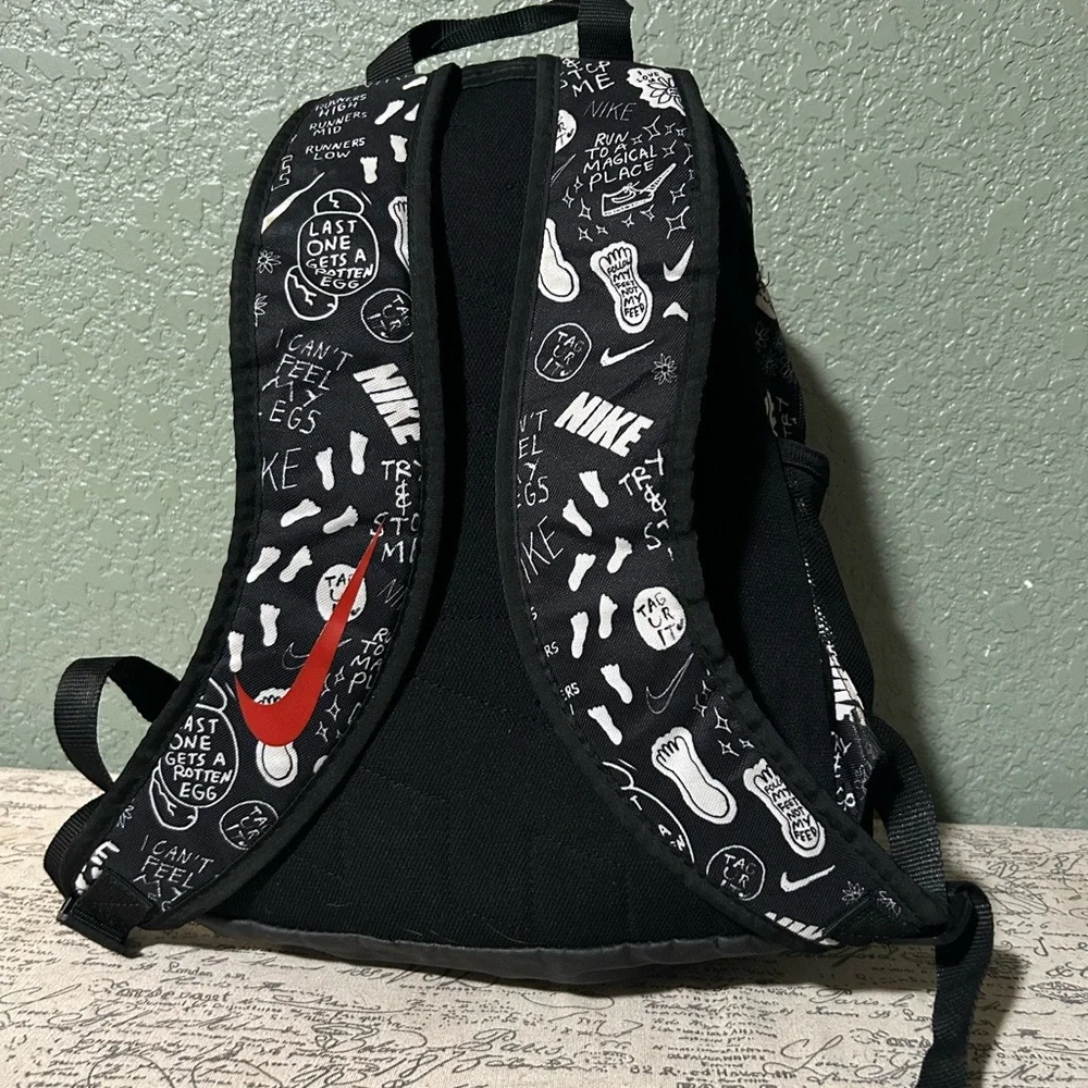 Nike Black Backpack with White Graphic and Red Accents